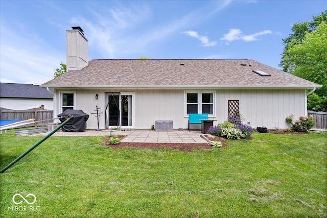 11041 Limbach Cir, Indianapolis, IN 46236 - rear view of house with a chimney, a patio area, and roof with shingles