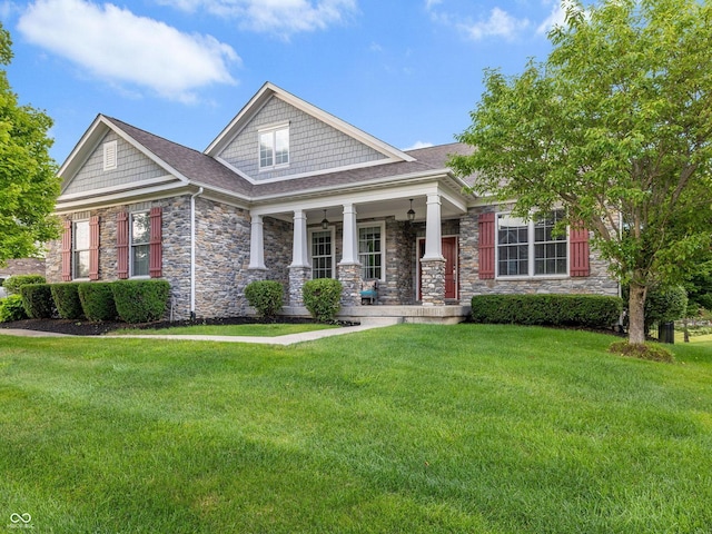 15292 Slateford Rd, Noblesville, IN 46062 - craftsman inspired home with stone siding, a porch, a front lawn, and a shingled roof