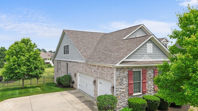 15292 Slateford Rd, Noblesville, IN 46062 - view of front facade with driveway, a shingled roof, and stone siding