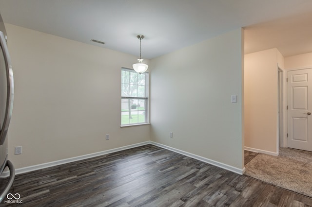 8684 Captain Dr, Avon, IN 46123 - unfurnished room featuring dark wood-style floors and baseboards