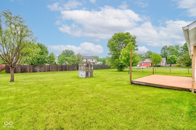8684 Captain Dr, Avon, IN 46123 - view of yard featuring a playground and a wooden deck