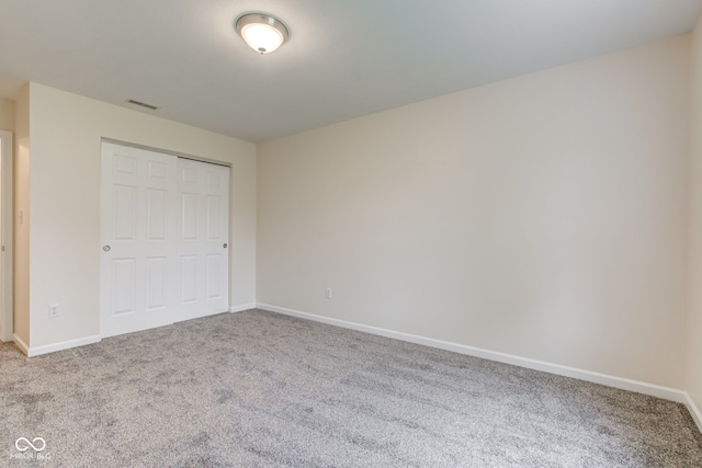 8684 Captain Dr, Avon, IN 46123 - unfurnished bedroom with carpet flooring, baseboards, and a closet