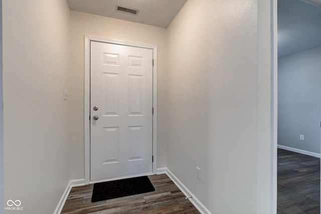 8684 Captain Dr, Avon, IN 46123 - doorway to outside with dark wood finished floors and baseboards