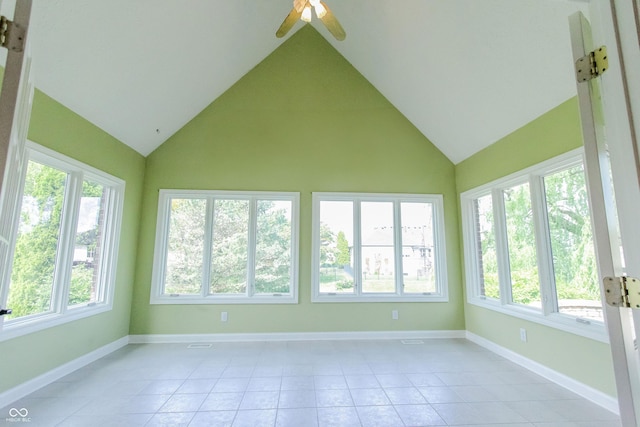 7093 Republic Ln, Indianapolis, IN 46259 - unfurnished sunroom featuring tile patterned floors, high vaulted ceiling, and baseboards