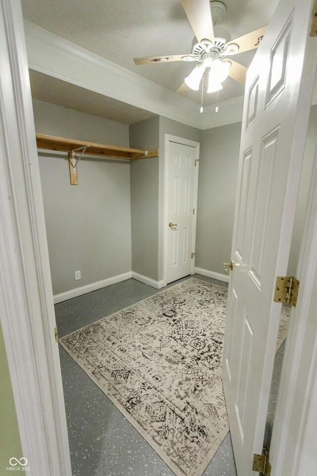 7093 Republic Ln, Indianapolis, IN 46259 - unfurnished bedroom featuring baseboards, ceiling fan, a closet, and speckled floor