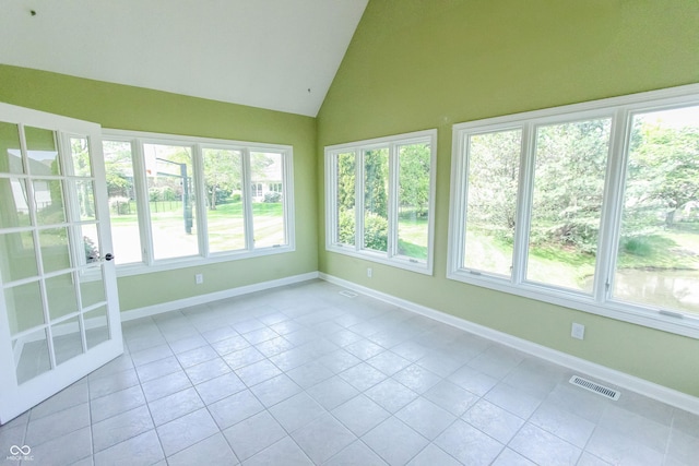 7093 Republic Ln, Indianapolis, IN 46259 - unfurnished sunroom featuring tile patterned floors, baseboards, and vaulted ceiling
