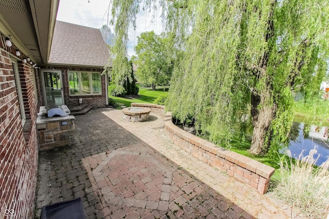 7093 Republic Ln, Indianapolis, IN 46259 - view of patio with a fire pit