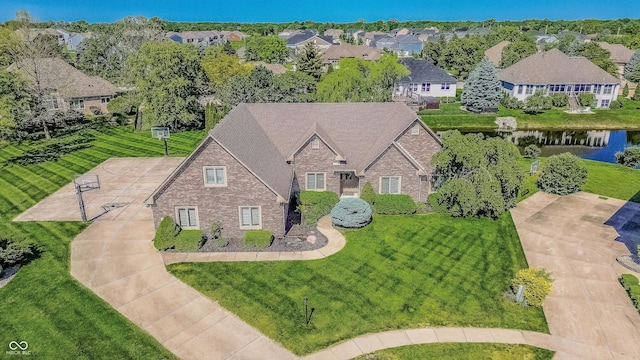 7093 Republic Ln, Indianapolis, IN 46259 - view of front facade featuring stone siding, brick siding, a water view, and a residential view