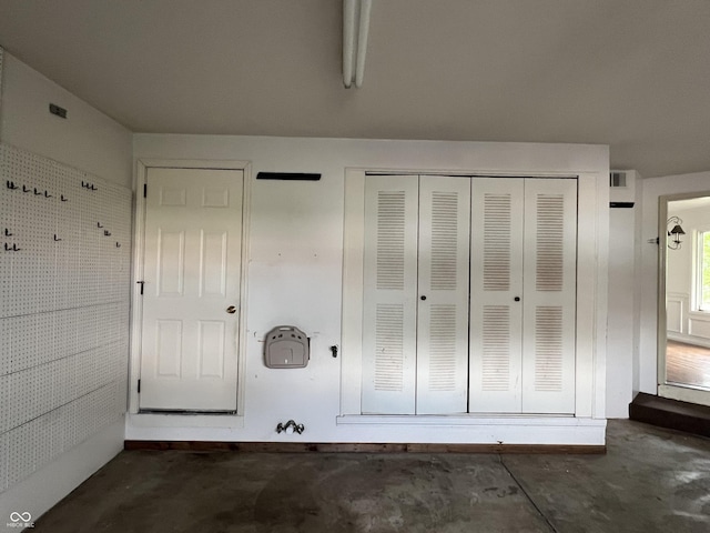 213 Golf Ct, Greenwood, IN 46143 - unfurnished bedroom featuring concrete floors and a closet