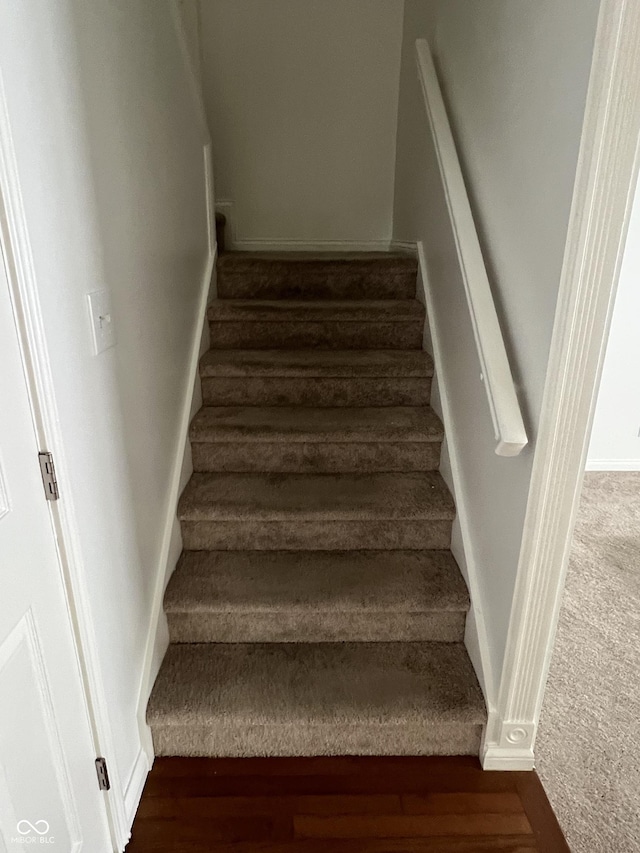 213 Golf Ct, Greenwood, IN 46143 - staircase featuring carpet flooring