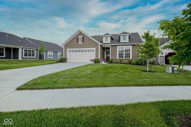 19144 Goins Blvd, Westfield, IN 46074 - view of front of home with concrete driveway, a front yard, and an attached garage