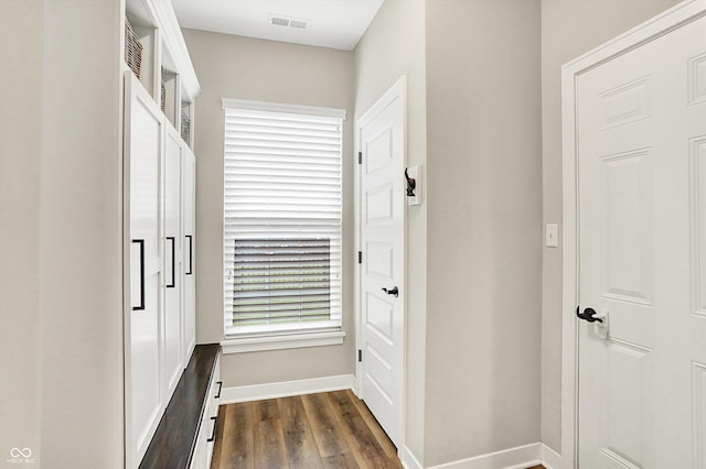 4602 Hayward Way, Westfield, IN 46062 - hallway with dark wood-style floors and baseboards