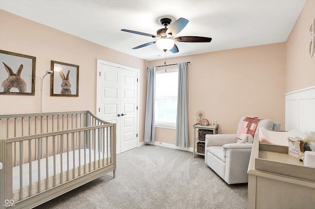 4602 Hayward Way, Westfield, IN 46062 - bedroom featuring carpet floors, a nursery area, baseboards, and ceiling fan