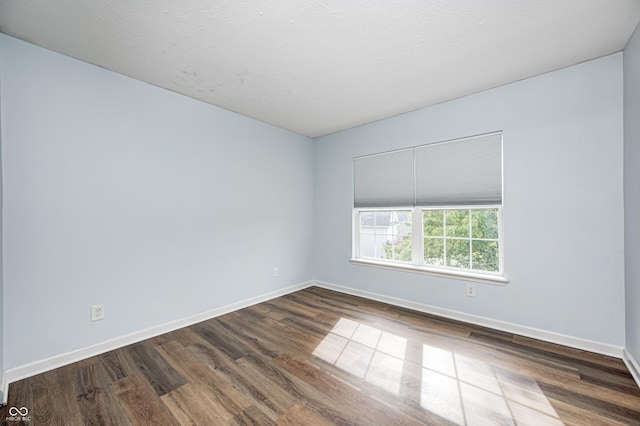 1306 Flat Wood Ct, Brownsburg, IN 46112 - empty room featuring dark wood-type flooring