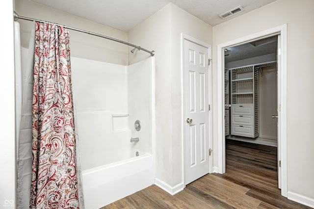 1306 Flat Wood Ct, Brownsburg, IN 46112 - full bath featuring wood finished floors and shower / bath combo