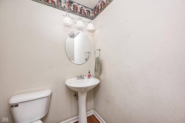 1306 Flat Wood Ct, Brownsburg, IN 46112 - bathroom with toilet and baseboards