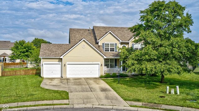 1306 Flat Wood Ct, Brownsburg, IN 46112 - traditional-style home with driveway, a garage, and a shingled roof