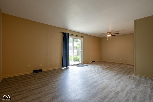 6 Heritage Dr, Terre Haute, IN 47803 - spare room with a ceiling fan, wood finished floors, and baseboards