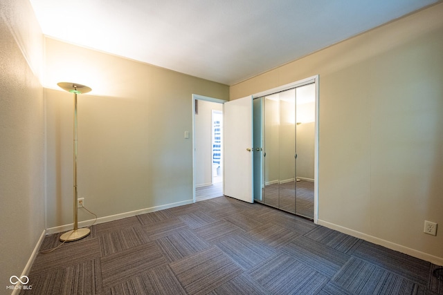 6 Heritage Dr, Terre Haute, IN 47803 - unfurnished bedroom featuring carpet floors, a closet, and baseboards