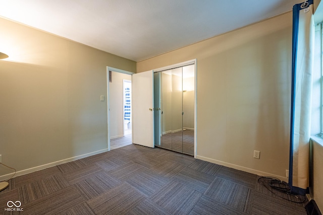 6 Heritage Dr, Terre Haute, IN 47803 - unfurnished bedroom with baseboards, carpet, and a closet