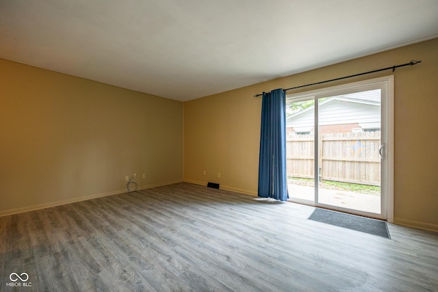 6 Heritage Dr, Terre Haute, IN 47803 - unfurnished room with wood finished floors and baseboards