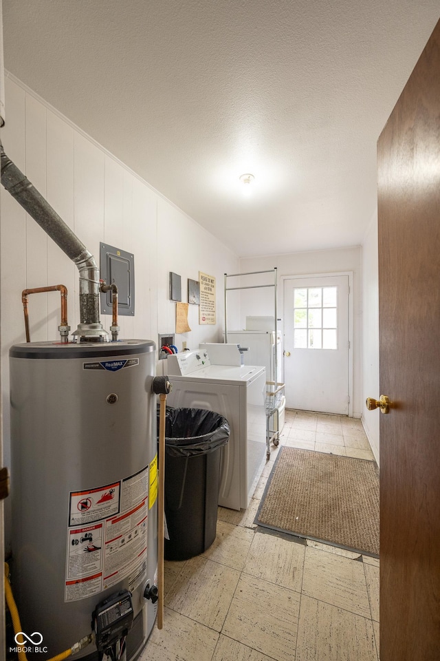 6 Heritage Dr, Terre Haute, IN 47803 - laundry room featuring gas water heater, separate washer and dryer, and light floors