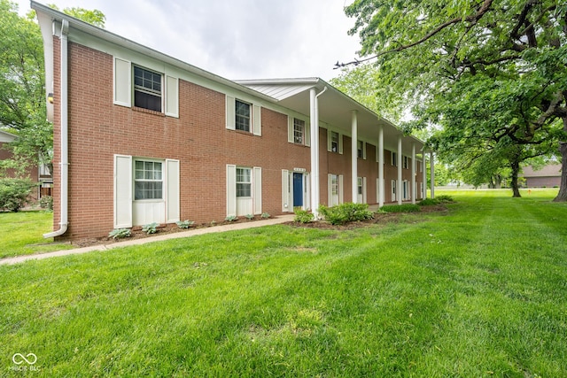 6 Heritage Dr, Terre Haute, IN 47803 - view of front of home featuring a front yard and brick siding