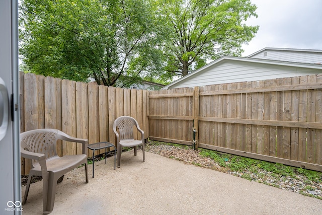 6 Heritage Dr, Terre Haute, IN 47803 - fenced backyard with a patio