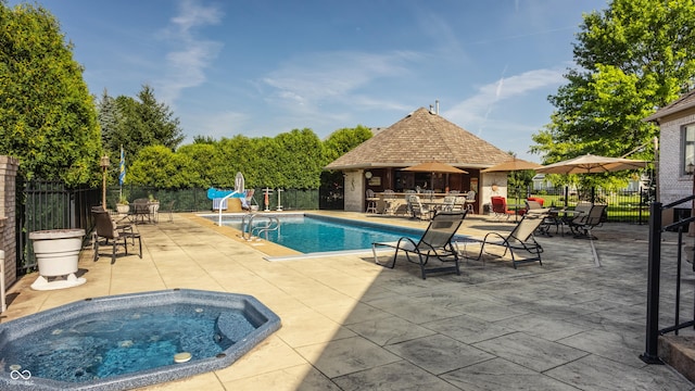4930 Benthaven Dr E, Bargersville, IN 46106 - view of swimming pool with an in-ground hot tub and a patio