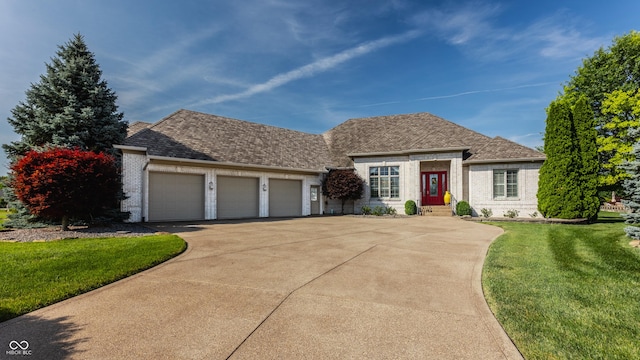 4930 Benthaven Dr E, Bargersville, IN 46106 - view of front of home featuring brick siding, an attached garage, concrete driveway, a front yard, and roof with shingles