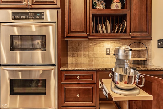 4930 Benthaven Dr E, Bargersville, IN 46106 - kitchen with stainless steel double oven, backsplash, and light stone countertops