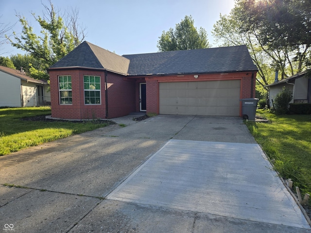 8810 Summer Walk Dr E, Indianapolis, IN 46227 - view of front of property featuring brick siding, concrete driveway, an attached garage, and a front lawn