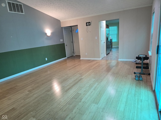 8810 Summer Walk Dr E, Indianapolis, IN 46227 - unfurnished room featuring light wood-style flooring, crown molding, and baseboards