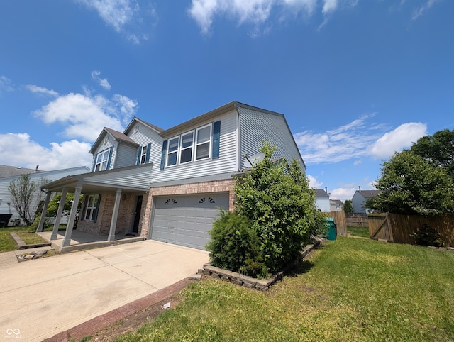 9206 Huntleigh Cir, Plainfield, IN 46168 - view of front of house featuring a porch, a garage, brick siding, and driveway