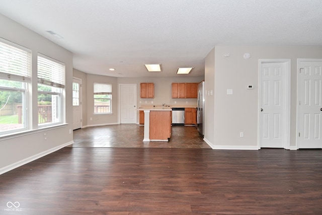 9206 Huntleigh Cir, Plainfield, IN 46168 - unfurnished living room with dark wood finished floors and recessed lighting