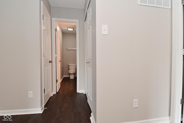 9206 Huntleigh Cir, Plainfield, IN 46168 - hall with dark wood-style floors and baseboards