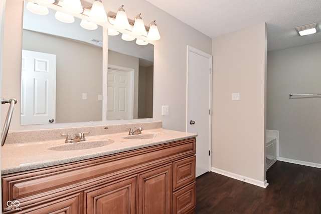 9206 Huntleigh Cir, Plainfield, IN 46168 - full bath featuring wood finished floors and double vanity
