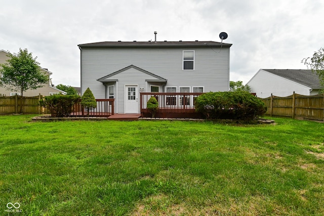 9206 Huntleigh Cir, Plainfield, IN 46168 - back of property with a fenced backyard and a wooden deck