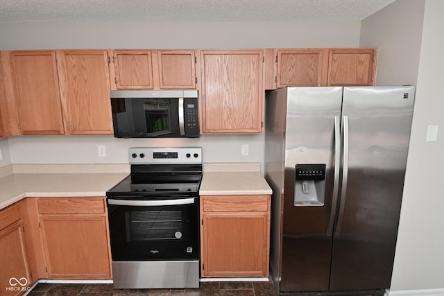 9206 Huntleigh Cir, Plainfield, IN 46168 - kitchen with appliances with stainless steel finishes and light countertops