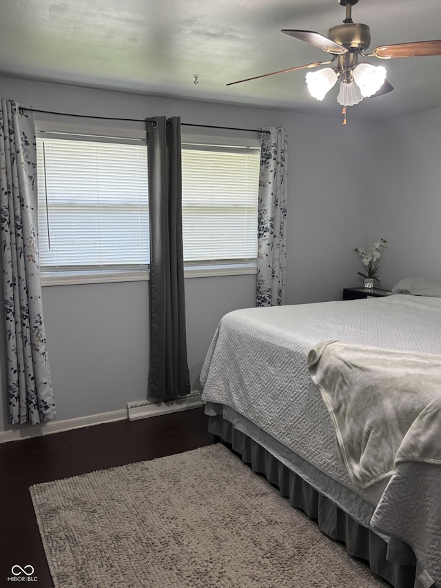 3031 W 18th St, Indianapolis, IN 46222 - bedroom featuring wood finished floors and a ceiling fan