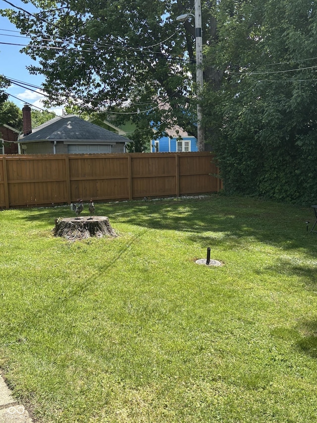 3031 W 18th St, Indianapolis, IN 46222 - view of yard featuring a fire pit