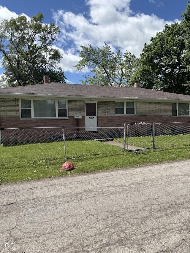 3031 W 18th St, Indianapolis, IN 46222 - view of front of property featuring brick siding and a chimney