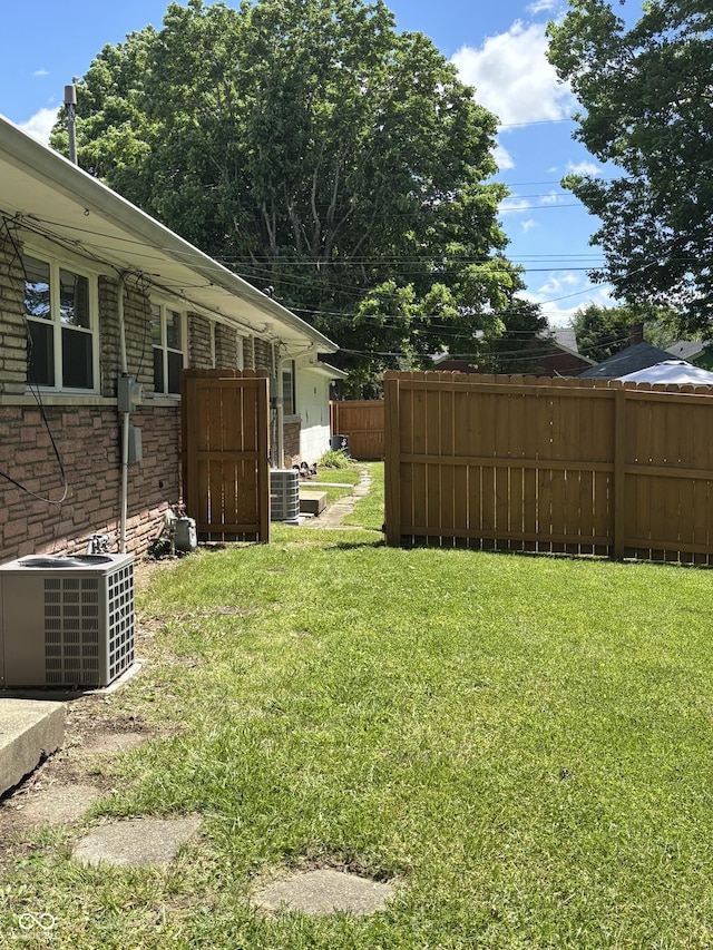 3031 W 18th St, Indianapolis, IN 46222 - view of yard featuring central AC