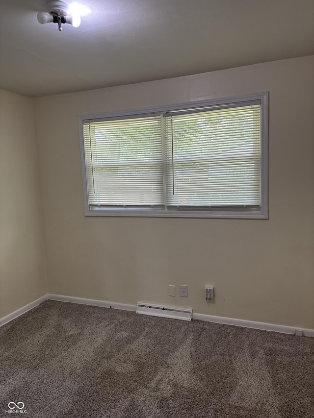 3031 W 18th St, Indianapolis, IN 46222 - unfurnished room featuring carpet, a baseboard radiator, and baseboards