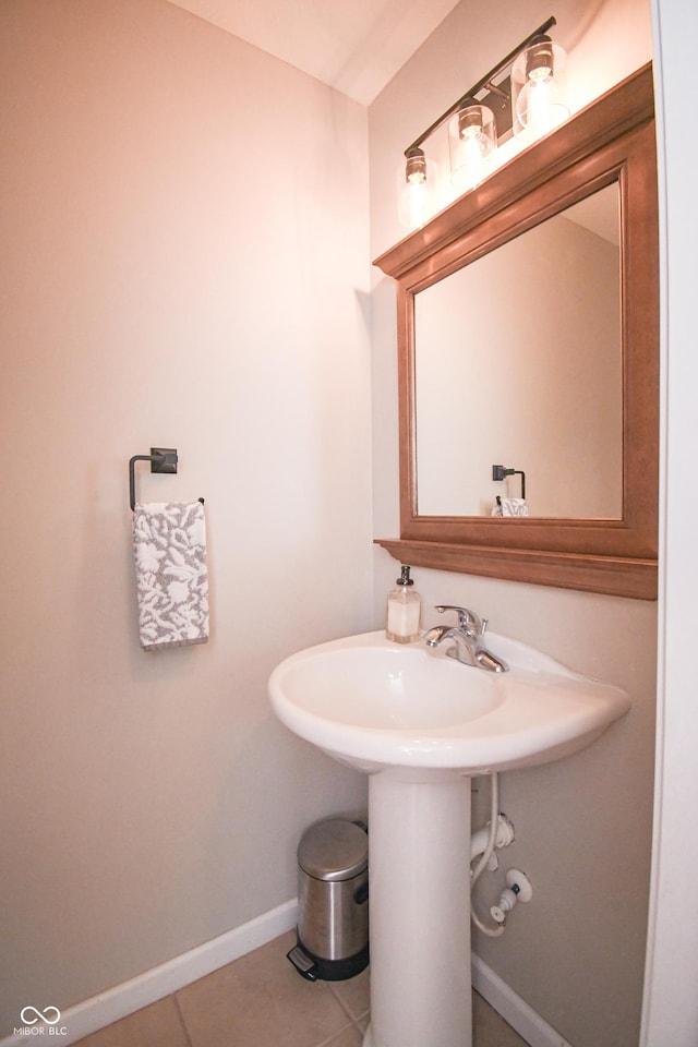 60 Bittersweet Ct, Seymour, IN 47274 - bathroom featuring tile patterned flooring and baseboards