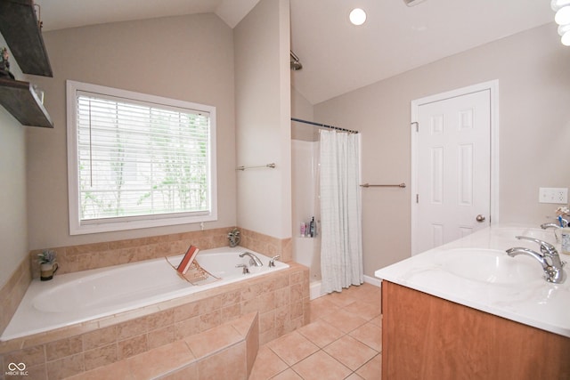 60 Bittersweet Ct, Seymour, IN 47274 - full bathroom featuring vaulted ceiling, tile patterned flooring, a garden tub, a shower with curtain, and double vanity
