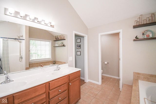 60 Bittersweet Ct, Seymour, IN 47274 - full bathroom featuring a tub, toilet, vaulted ceiling, double vanity, and tile patterned floors