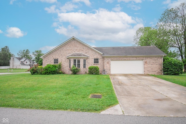60 Bittersweet Ct, Seymour, IN 47274 - view of front facade with brick siding, a garage, driveway, and a front yard
