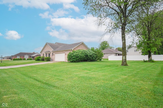 60 Bittersweet Ct, Seymour, IN 47274 - view of front of house with brick siding, a garage, and concrete driveway