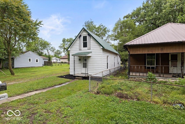 3218 N 24th St, Terre Haute, IN 47804 - rear view of house featuring metal roof
